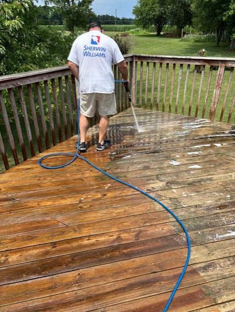 Deck cleaning with pressure washer